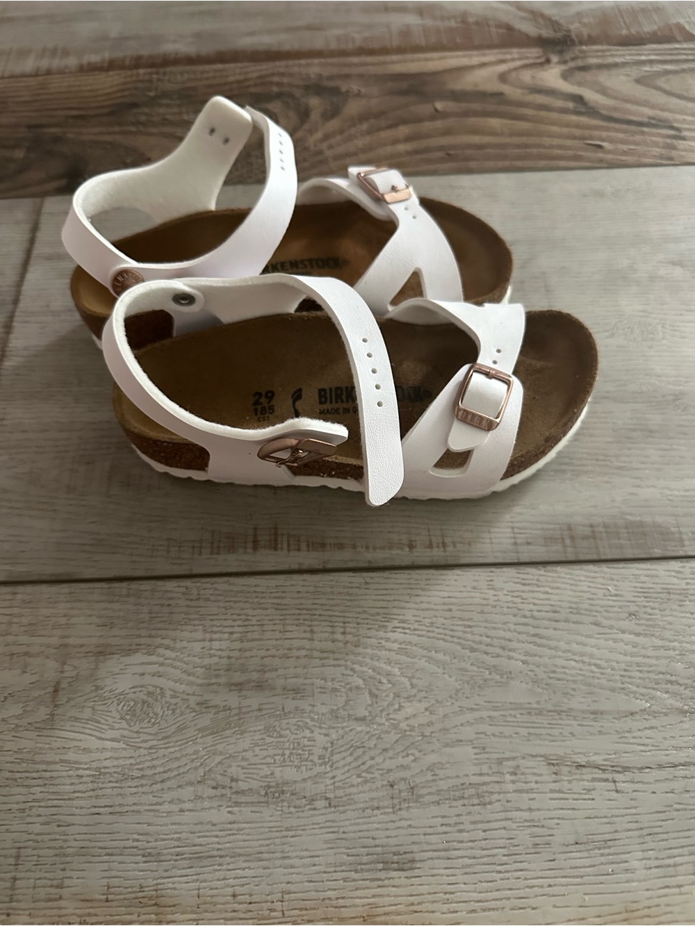 Birkenstock Kids White Sandals with Rose Gold Buckles